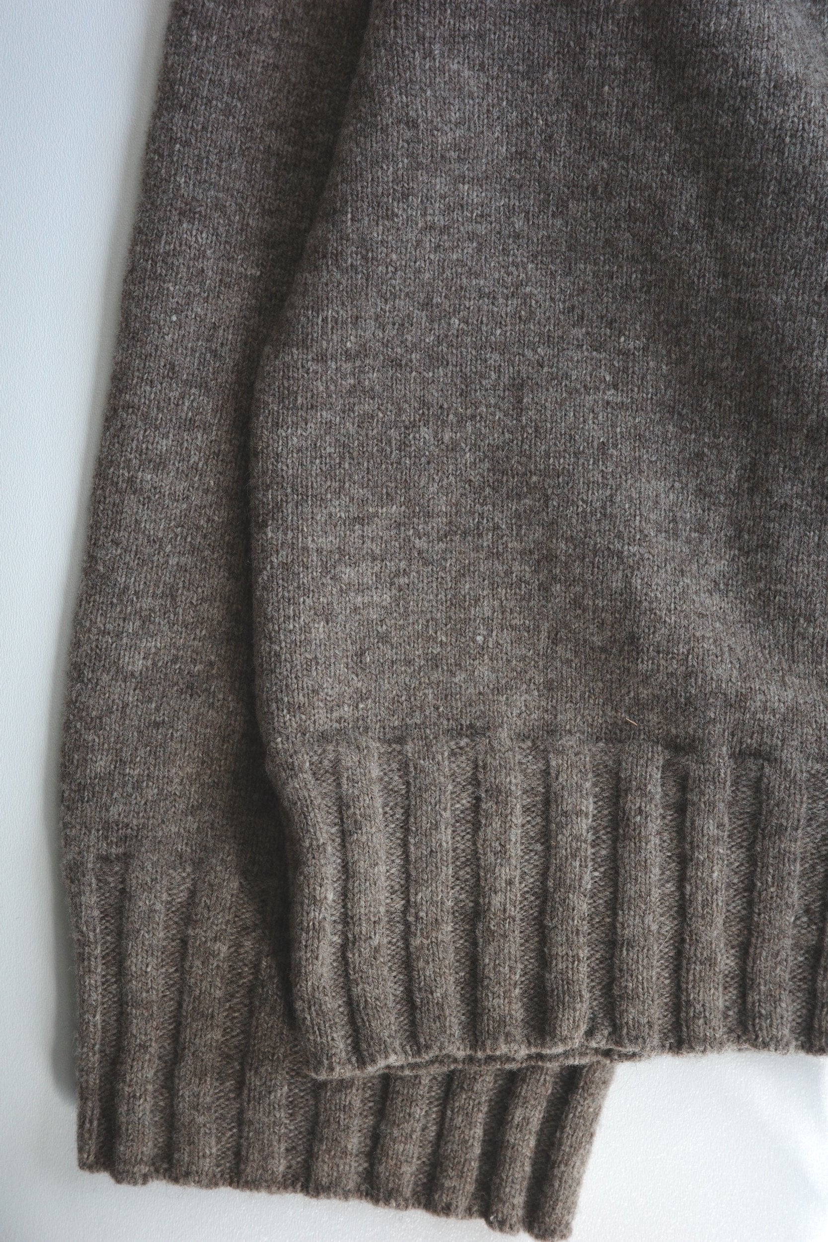 Ribbing detail on a sweater sleeve