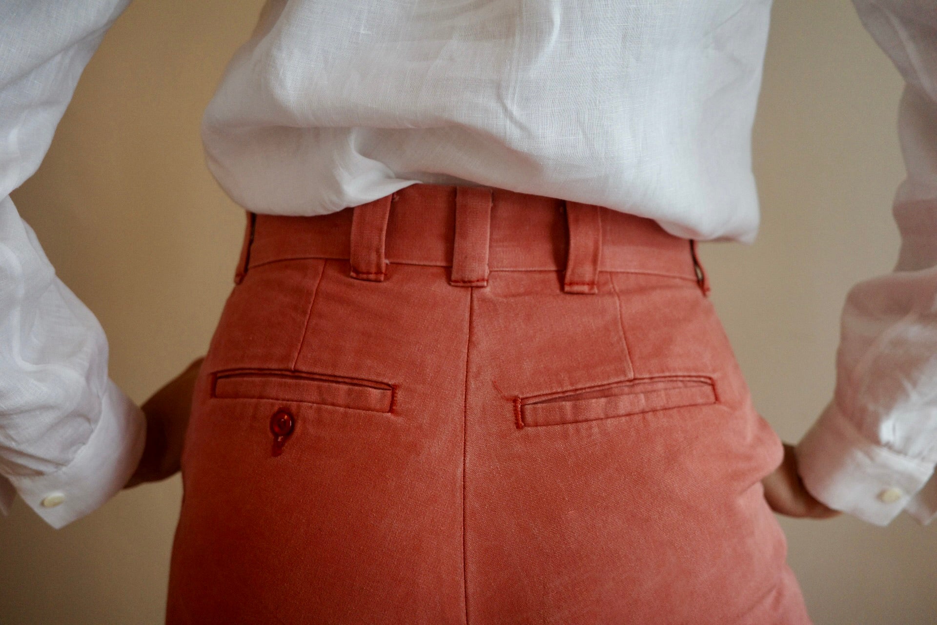Close up detail of back of red trousers