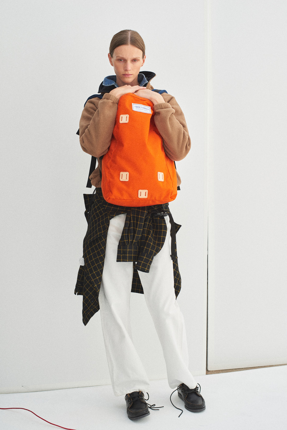 The Black Crag Backpack in Orange