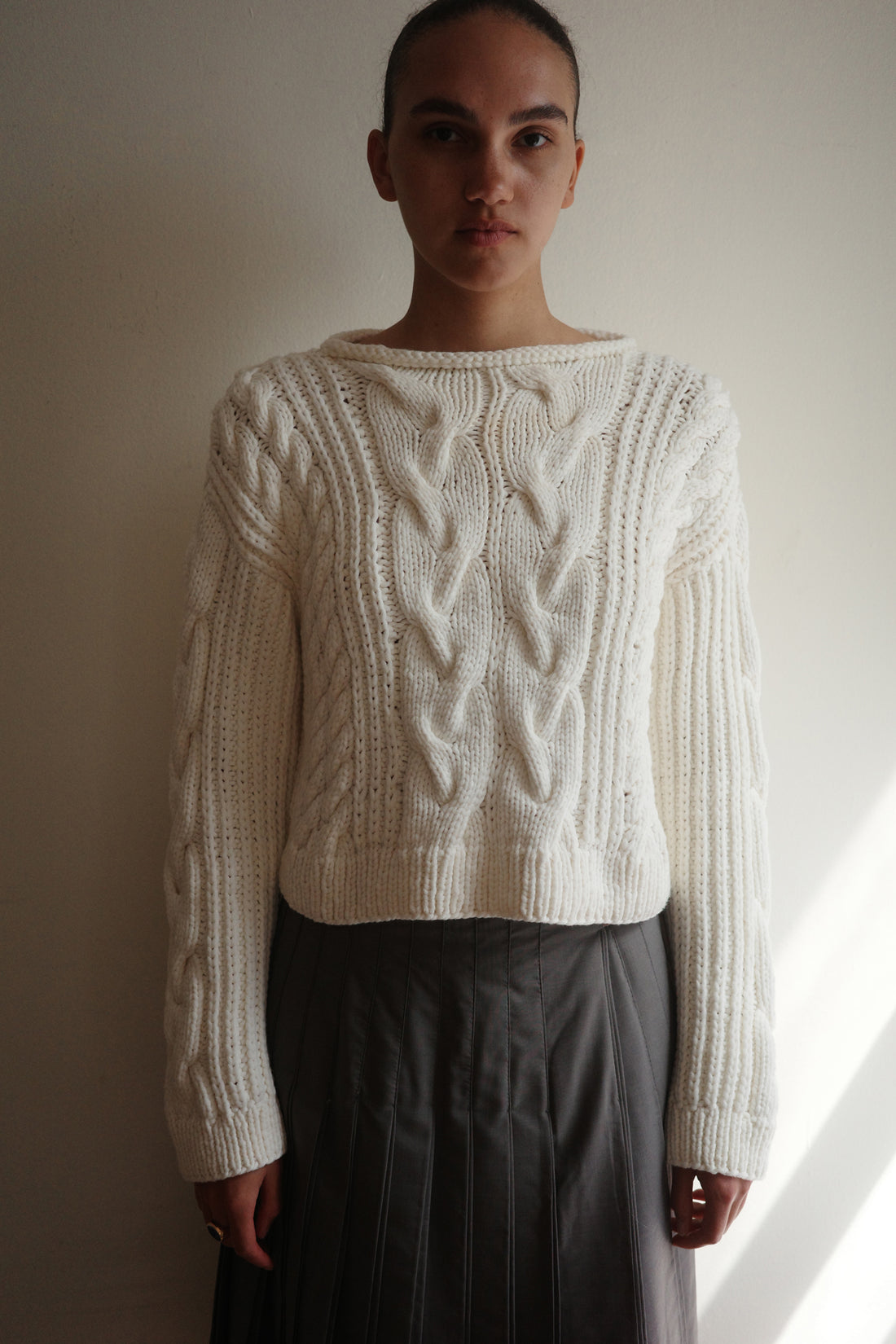 The Cropped Cable Knit Sweater